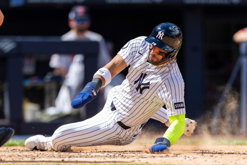 Yankees right fielder Jose Caballero scores on a Paul Goldschmidt single in the fifth inning against the Red Sox on June 7, 2026.