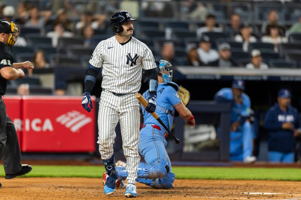 New York Yankees catcher Austin Wells (28) reacts after striking out looking against the Toronto Bluejays.