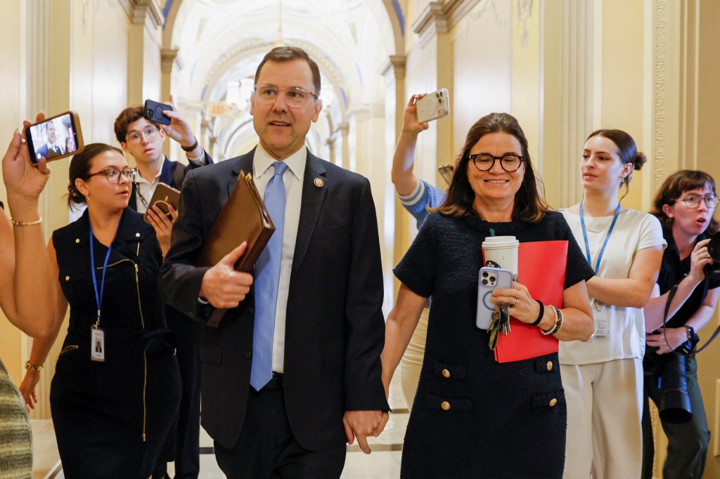 U.S. Representative Tom Kean (R-NJ) arriving for a floor speech at the U.S. Capitol, surrounded by people filming him with phones.
