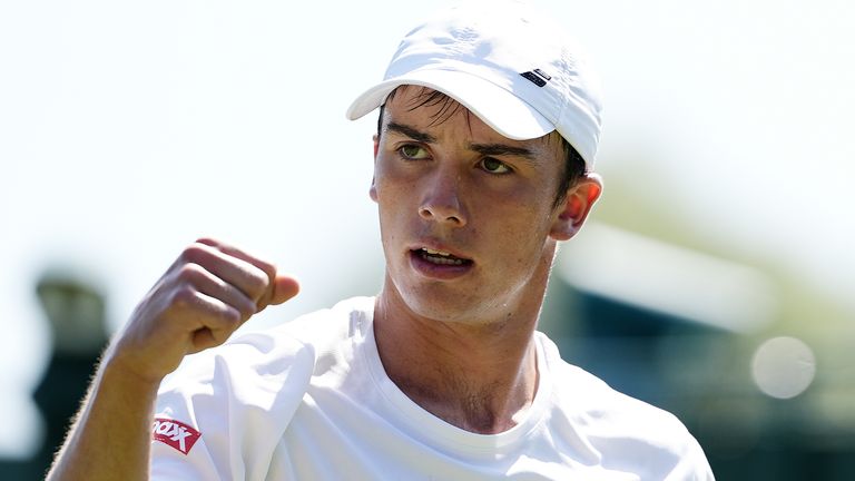 Oliver Tarvet celebrates during his match against Leandro Riedi on day one of the 2025 Wimbledon Championships at the All England Lawn Tenni