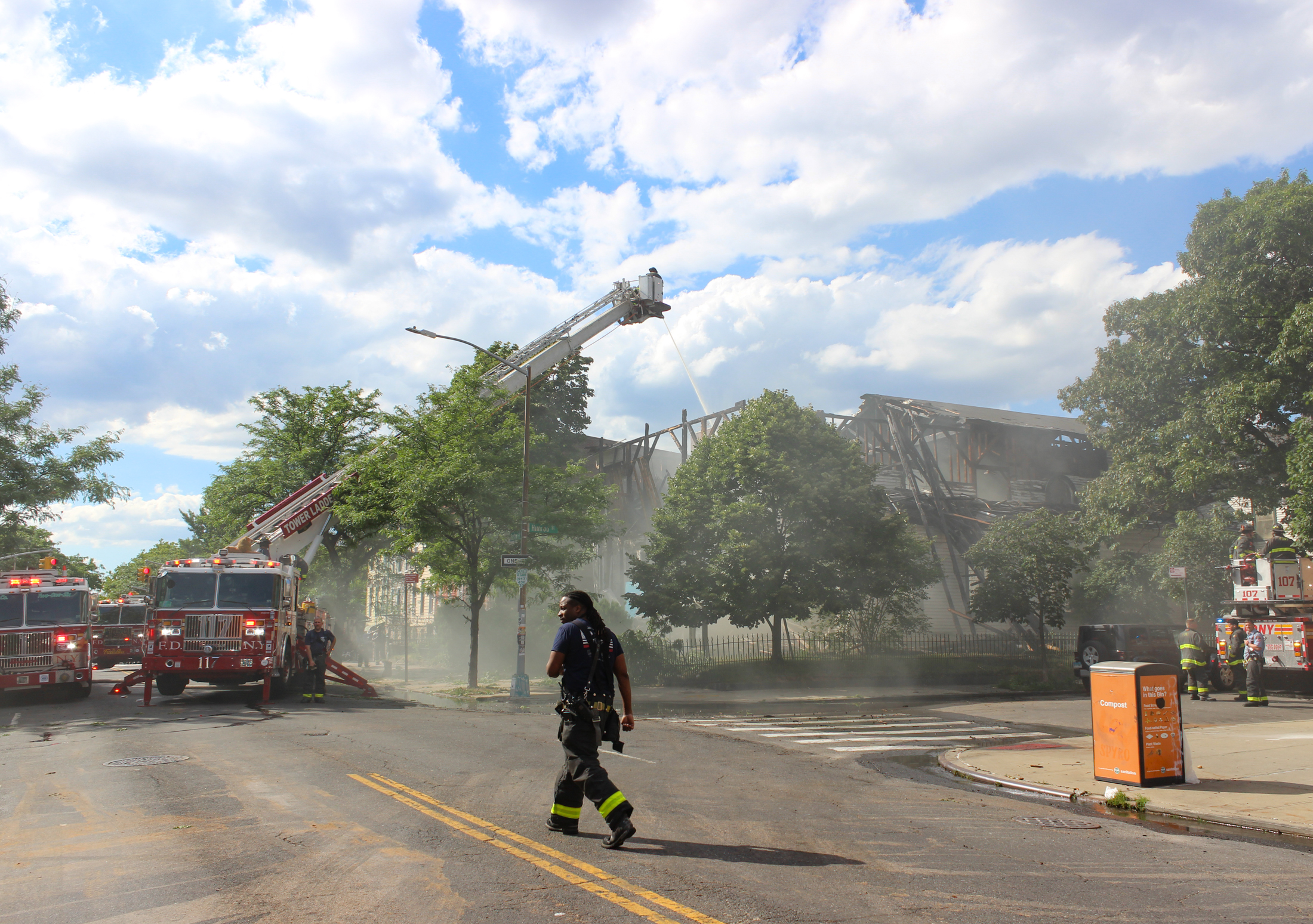 firefighter walking by church