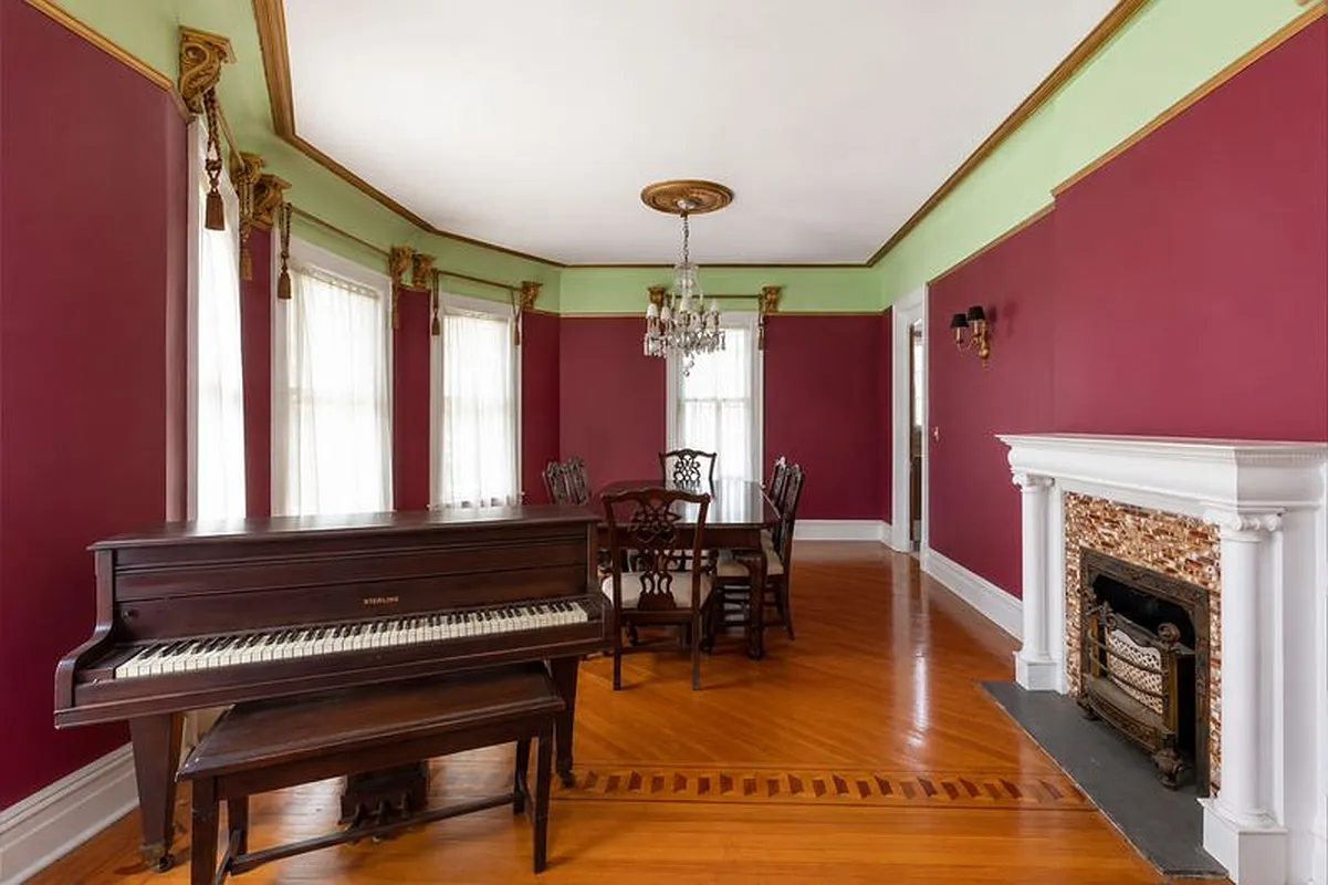parlor with mantel, red walls