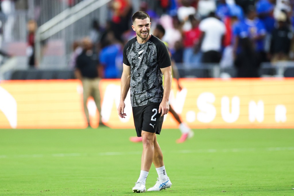 Tim Payne of New Zealand warming up before an international friendly soccer match.