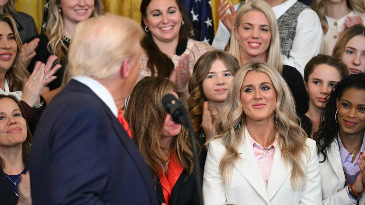 President Donald Trump acknowledges former Kentucky swimmer Riley Gaines in the East Room of the White House