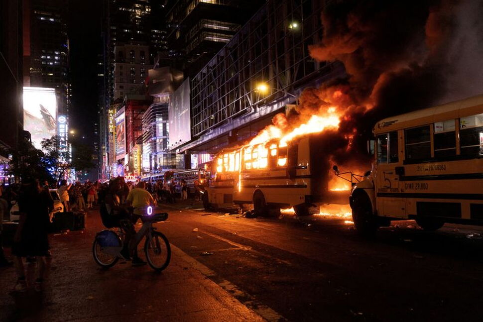 World Cup Bus Set Alight as Chaotic Celebrations Erupt in Manhattan After Knicks Win