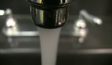 Water coming out of a faucet