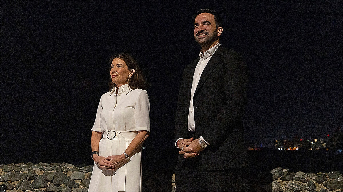 New York Gov. Kathy Hochul and New York City Mayor-elect Zohran Mamdani standing together at a conference in San Juan Puerto Rico