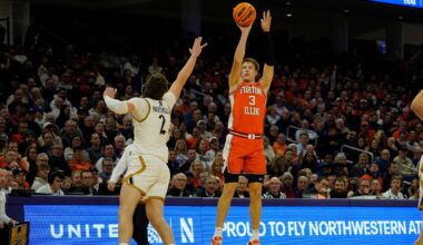 Dec 6, 2024; Evanston, Illinois, USA; Illinois Fighting Illini forward Ben Humrichous (3) shoots over Northwestern Wildcats forward Nick Martinelli (2) during the first half at Welsh-Ryan Arena. Mandatory Credit: David Banks-Imagn Images