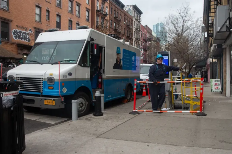 A Con Edison workers do repair work in the East Village, Feb. 22, 2022. Credit: Ben Fractenberg/THE CITY
