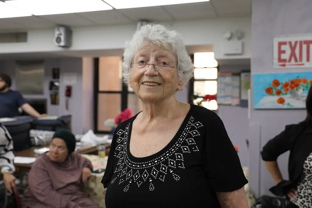 Cancer survivor Anne Klein attends lunch at the Ehi Ezer Ocean Parkway Senior Center