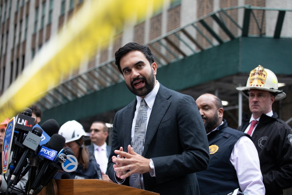Mayor Zohran Mamdani speaks alongside FDNY officials after an office building on East 42nd Street was evacuated for fear of collapse