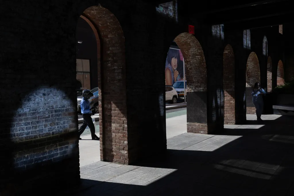 Workers headed into the Refinery at Domino office building along the Williamsburg waterfront,