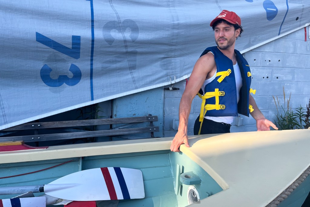 Members of the Village Community Boathouse take homemade vessels onto the Hudson River