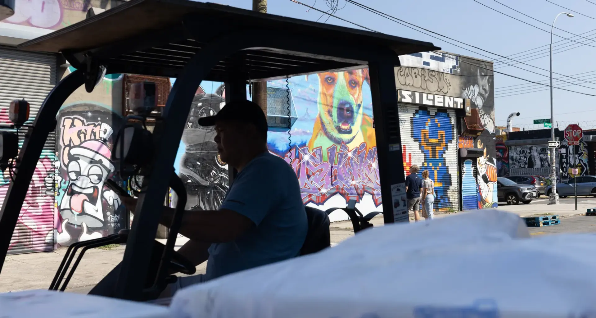 A worker drives a forklift in an industrial part of Bushwick, July 9, 2026. Credit: Ben Fractenberg/The City Reporter