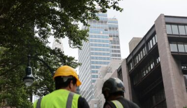 Above, a view of the former Pfizer headquarters, where columns buckled, in New York City on July 7. After fears of a collapse, the building has since been deemed stable.