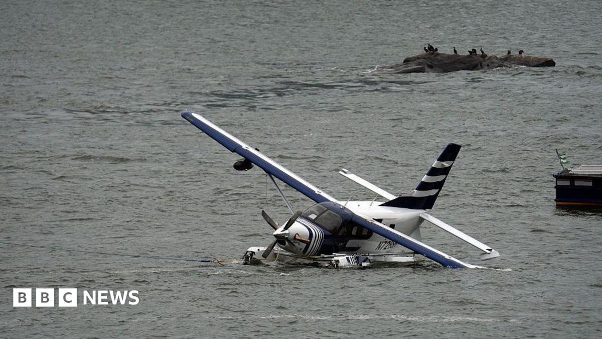 Emergency services on a boat respond to a crashed seaplane in the East River on 5 July 2026 in New York City.
