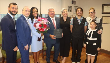 From left: Alejandro Colon-Cedeno, Hon. Patrick Hayes Torres, Hon. Dagmar Plaza-Gonzalez, Brooklyn District Attorney Eric Gonzalez, Kathleen Garcia-Aracena, Nikolai Garcia, Lillian Mosley and Rose Garcia. Photo: Mario Belluomo/Brooklyn Eagle