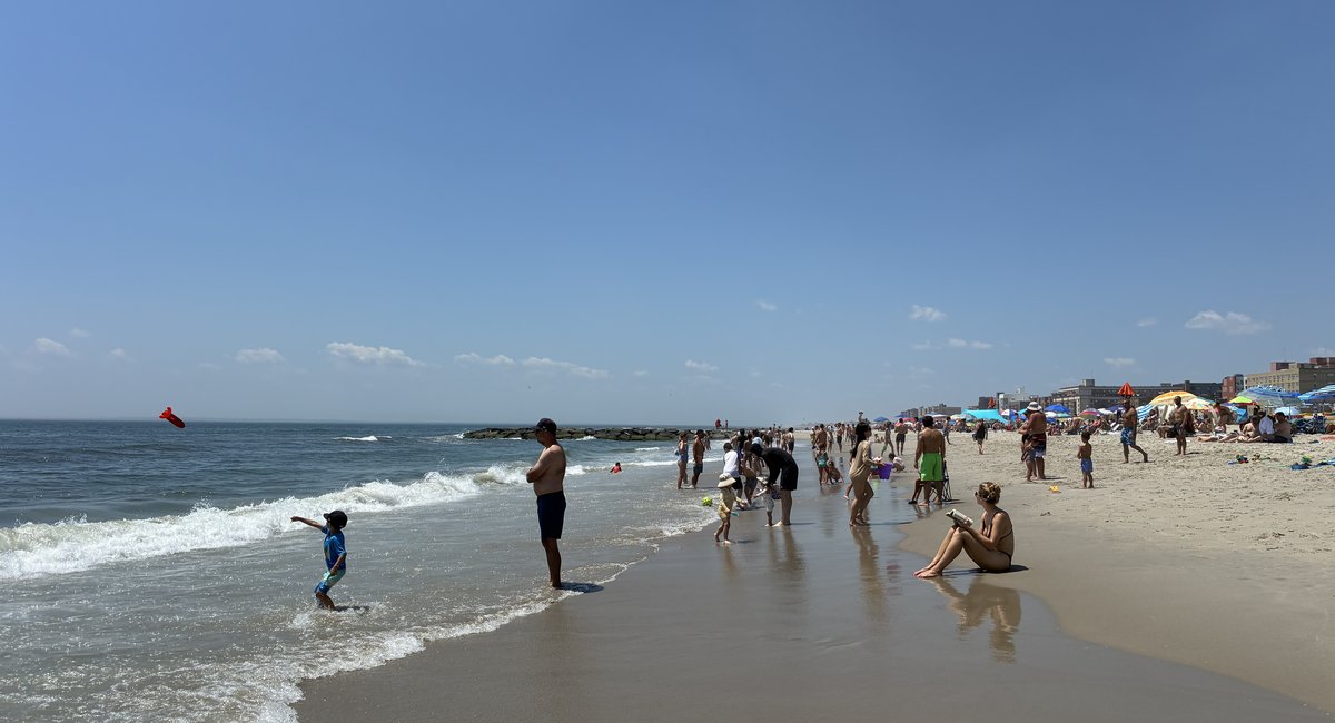 Shark scares surge at NYC beaches, sidelining swimmers on sizzling sand