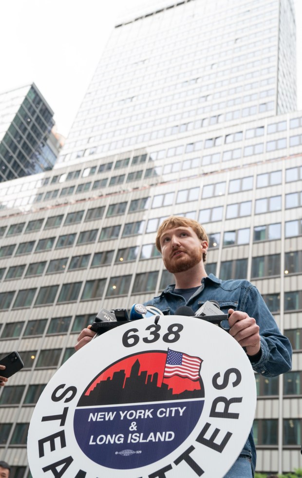 Sean Dow, now being called the "42nd St. Hero" speaks during a press conference near 235 E. 42nd St. Thursday, July 9, 2026 in Manhattan, New York. Dow is the shop steward from Steamfitters Local 638 who warned workers about the collapsing structure at 235 E. 42nd St. (Barry Williams/ New York Daily News)