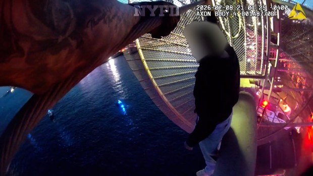 Authorities released video, that includes a mixture of surveillance footage and body-camera video, showing NYPD officers save a woman who was threatening to jump from the Brooklyn Bridge. (NYPD)