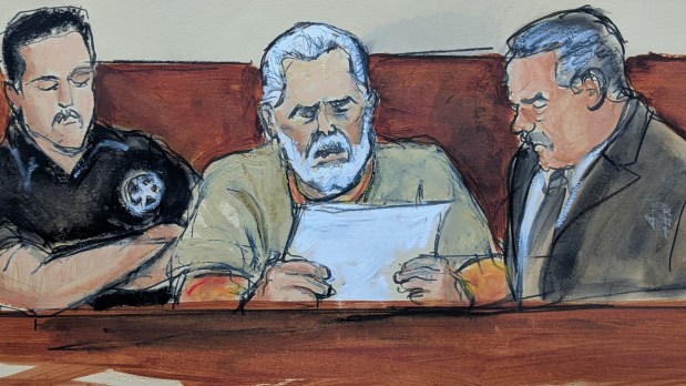 In this courtroom sketch, Ismael 'El Mayo' Zambada, center, reads his sentencing statement, flanked by a U.S. Marshal, left, and his attorney Frank Perez, right, in federal court in Brooklyn on Monday. 