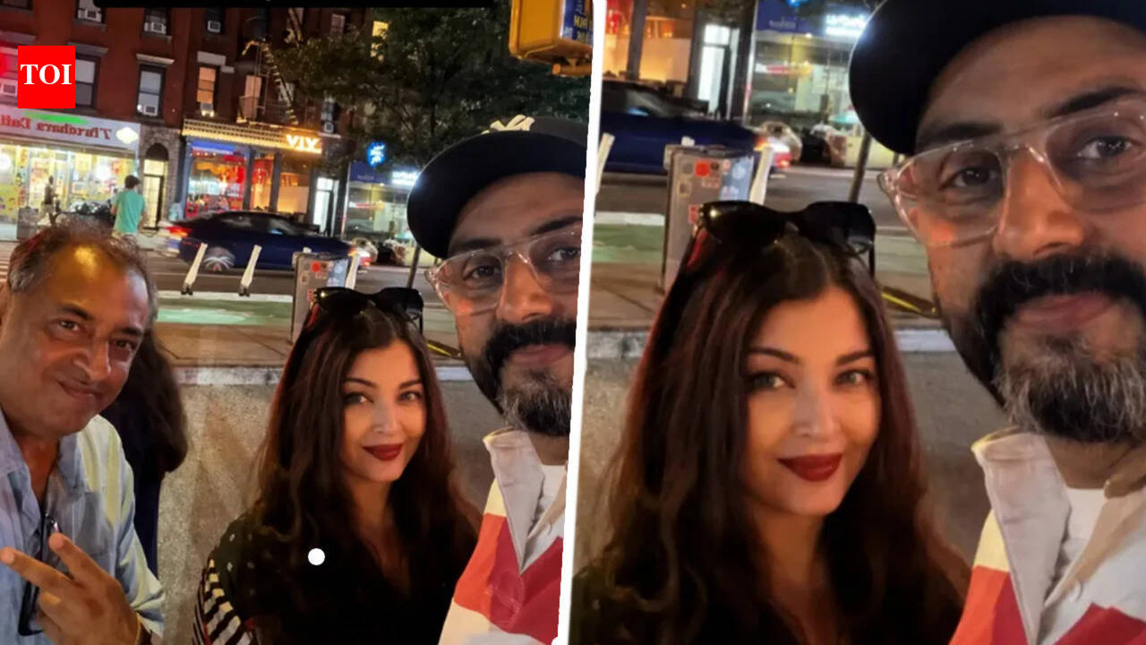 Abhishek Bachchan and Aishwarya Rai Bachchan spotted together in New York; pose with fan for a selfie |