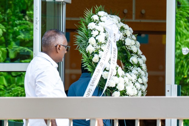 A wreath from the New York City Department of Veteran Affairs is delivered ahead of the funeral services for Staff Sgt. Angel Rampersad, a U.S. service member who was killed in an Iranian missile attack on an air base in Jordan, at the Calvary Assembly of God Church on Rockaway Blvd. in Ozone Park, Queens, on Friday, July 31, 2026. (Theodore Parisienne / New York Daily News)