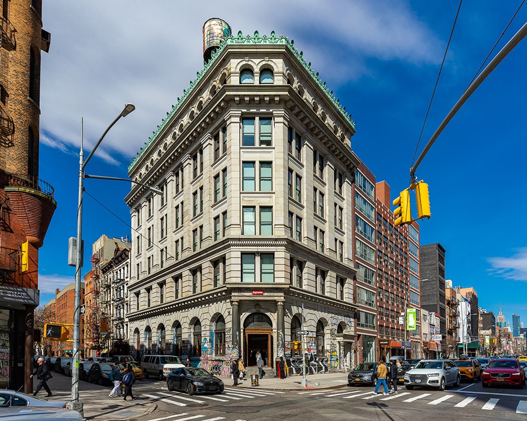 The 190 Bowery building, a large corner building with a green roof, in New York, New York.