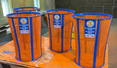 5 people set to win Knicks-themed trash cans from the sanitation department in NYC