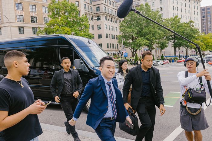 Justin Sun, the Chinese-born crypto billionaire, prepares to enter the White House in Washington, May 23, 2025. (Jason Andrew/The New York Times)