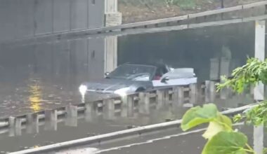 Drivers seen climbing out windows as floodwaters rise in Queens