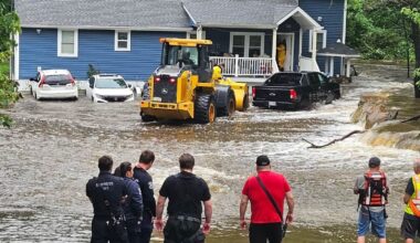 Family rescued from flooded home by firefighters using front-end loader in Philipstown, Putnam County