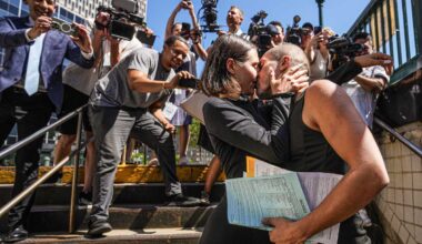Daredevil couple who climbed Empire State Building kiss after being released from Manhttan court