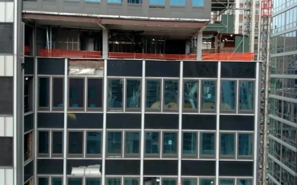 The building appears to be tilting in photographs shared by the New York fire department