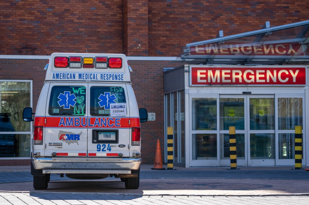 NEW YORK, NY - APRIL 16: An ambulance sits in the emergency room bay of Lincoln Medical Center on April 16, 2020, in the Bronx borough on New York City.