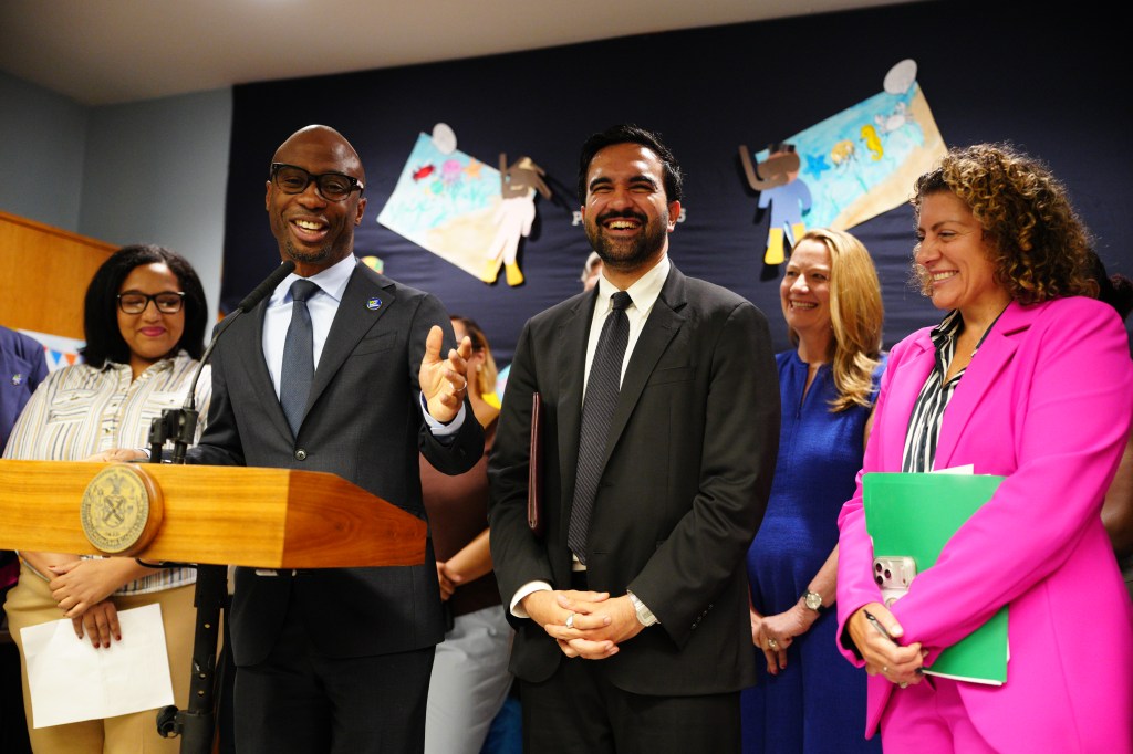 New York City Mayor Zohran Mamdani and New York City Public Schools Chancellor Kamar Samuels (gray suit, light blue shirt, lapel pin) during a press conference at P.S. 5 Ellen Lurie School in New York, 