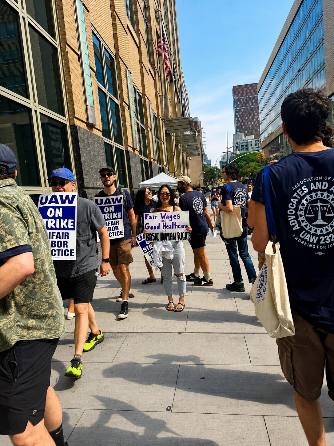 Members of the Brooklyn Defender Services union picket after contract negotiations broke down. The union and management bargained for approximately 21 hours before employees launched the strike.