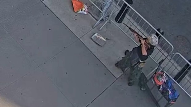 Authorities released surveillance footage of the moment they said Andrew Arrabaca, an Army veteran, set off fireworks and appears to brandish a weapon outside 26 Federal Plaza in New York City on Monday, July 20, 2026. (U.S. Attorney's Office)