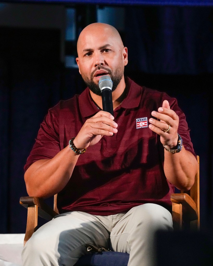 Hall of Fame Inductee Carlos Beltran answers questions during the media press conference at the Clarke Sports Center in Cooperstown, NY. 
