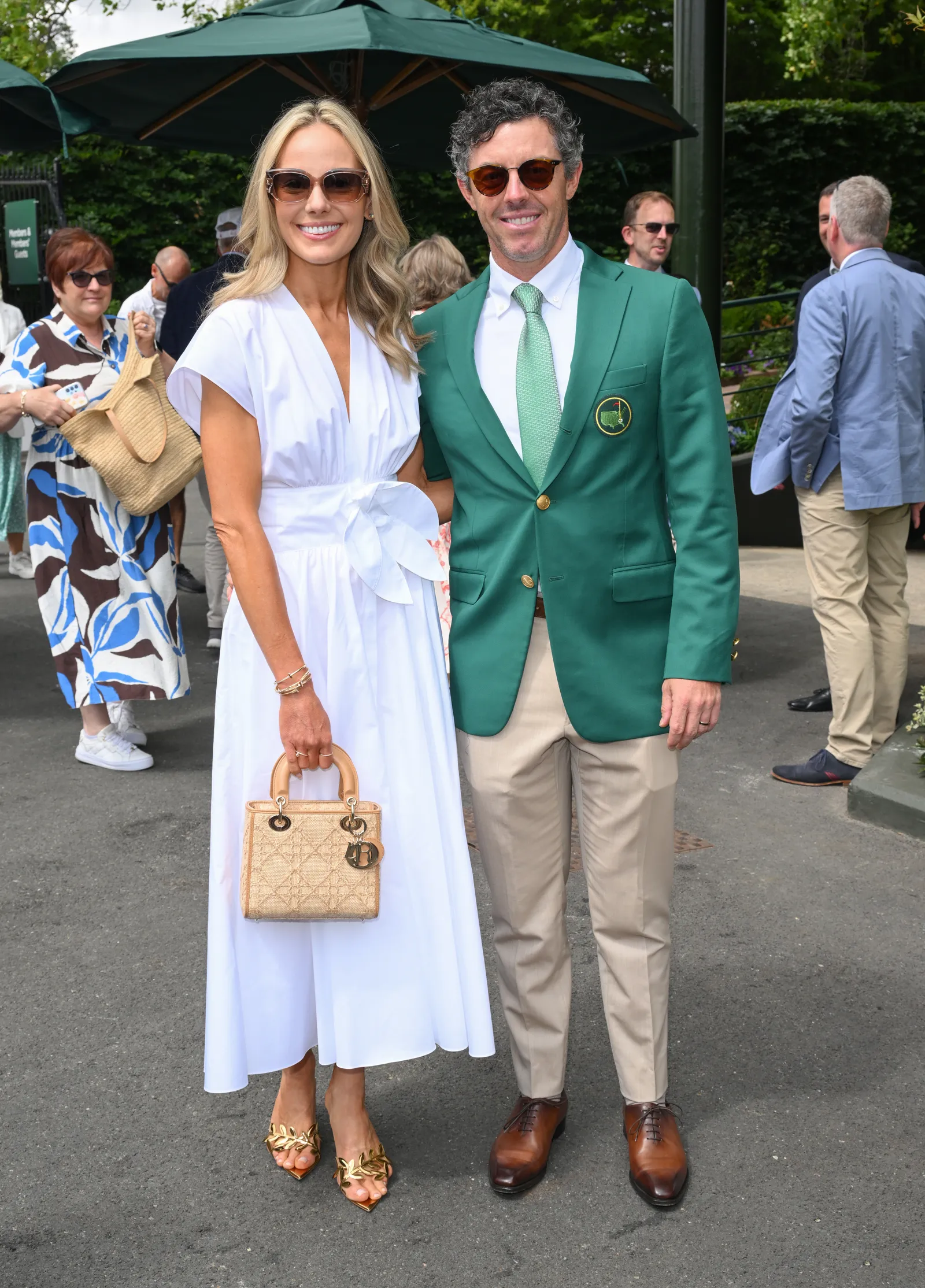 Image may contain Rory McIlroy Julieta Cardinali Jenny Shipley Accessories Bag Handbag Blazer Clothing and Coat