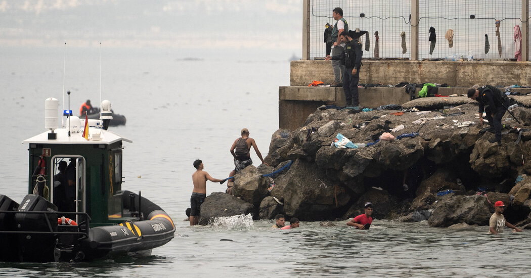 Spain’s Leader Rushes to Ceuta After Tens of Thousands of Migrants Cross From Morocco: Live Updates