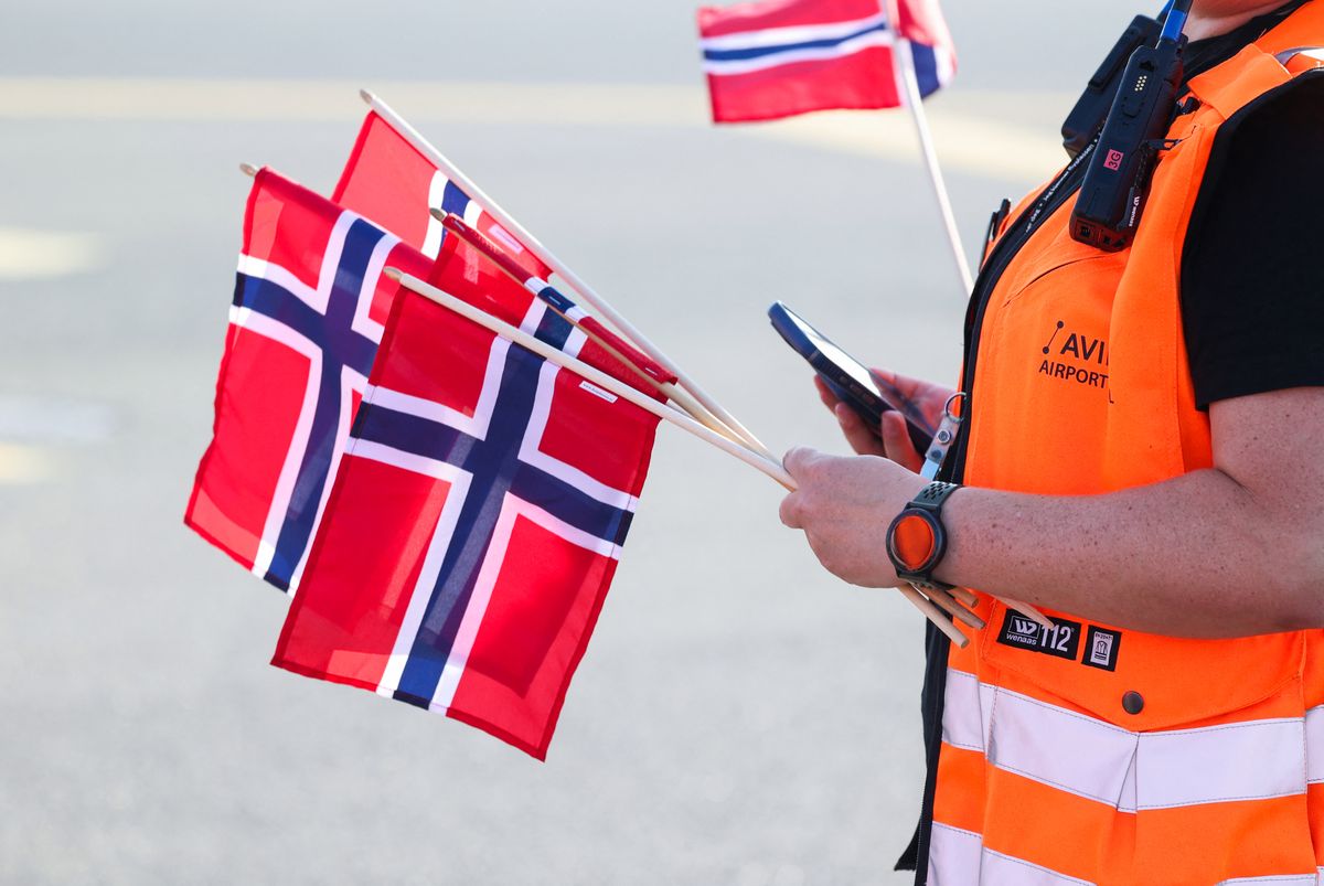 The plane of the Norway's national football team is greeted by ground staff at Oslo's Gardermoen Airport on July 13, 2026. 