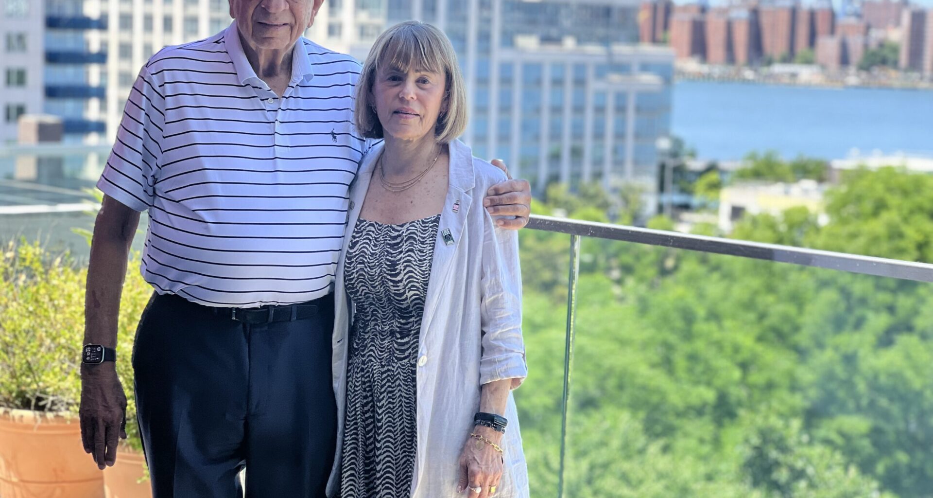 Norman Brodsky and his wife, Elaine, on the balcony of their Williamsburg office. Photo: Wayne Daren Schneiderman/Brooklyn Eagle