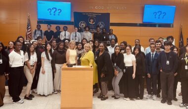 Debra Sinodinos, Hon. Deborah Dowling and Nicole B. Smith alongside interns. Photo: Wayne Daren Schneiderman/Brooklyn Eagle