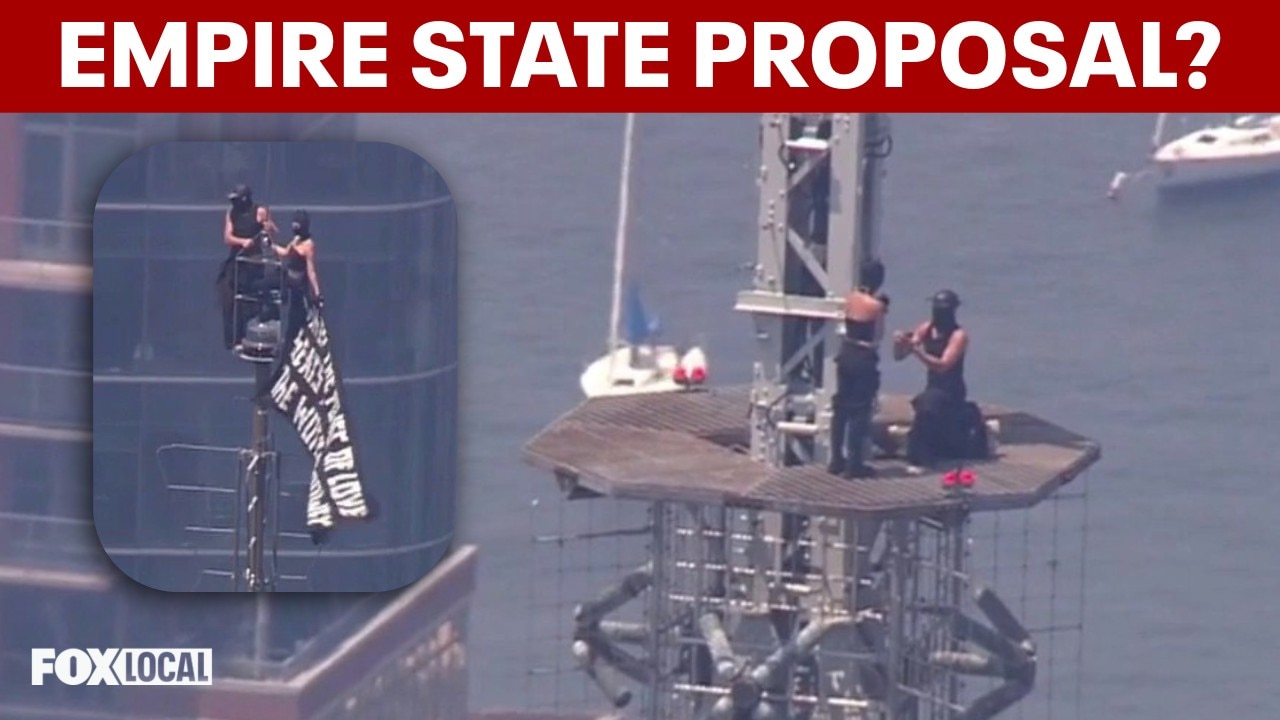 Partner proposes on Empire State Building spire after climbing to raise flag