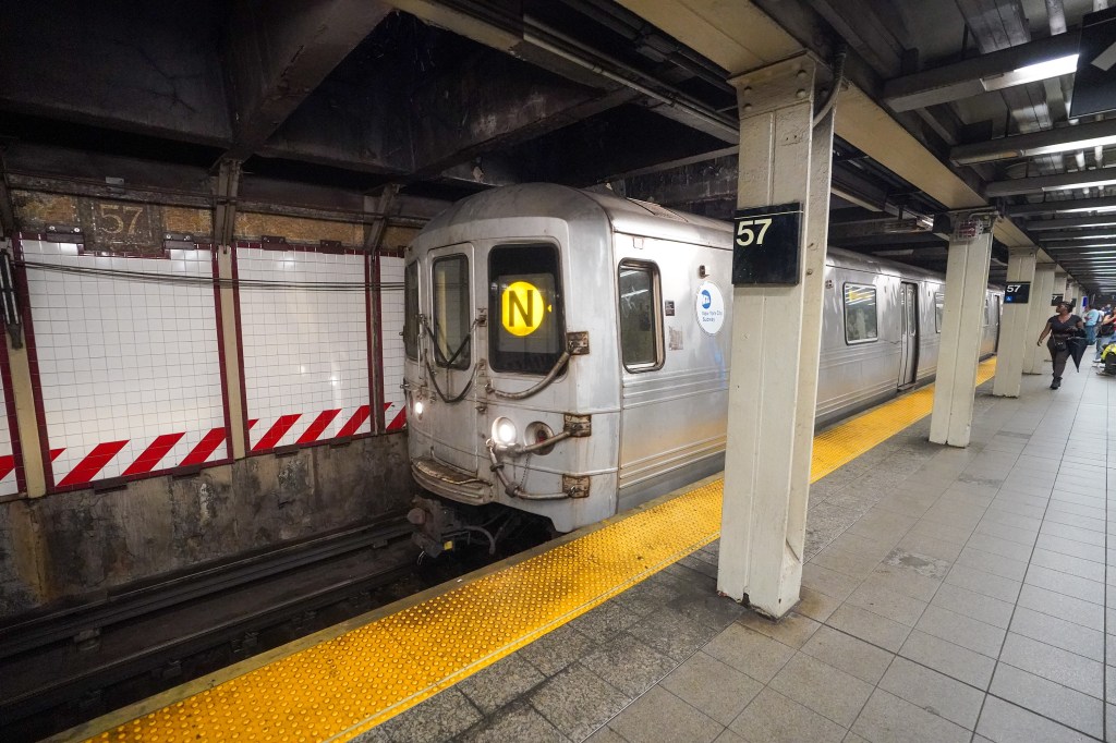 Subway train with an "N" on the front at the 57th Street station.