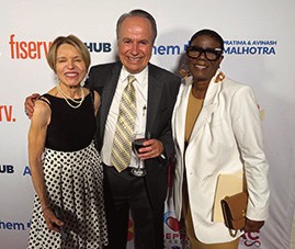 Diana Parisy, Board Vice President; Paul Halvatzis; and Yvette Watts, Board President.