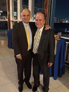 Evan Metalios, QSAC Treasurer and 2026 Beacon Award Recipient and Paul Halvatzis, a Vice President of QSAC.