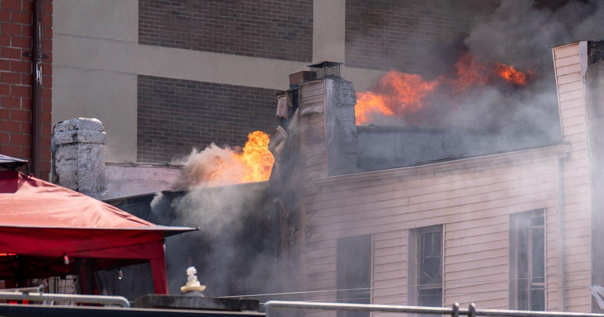 Woman, 78, dies, 17 firefighters hospitalized as blaze tears through row of Queens homes: FDNY | National News