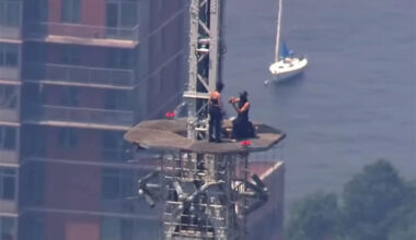 2 People Climb to Top of N.Y.C.'s Empire State Building with World Peace Banner Before Seemingly Getting Engaged